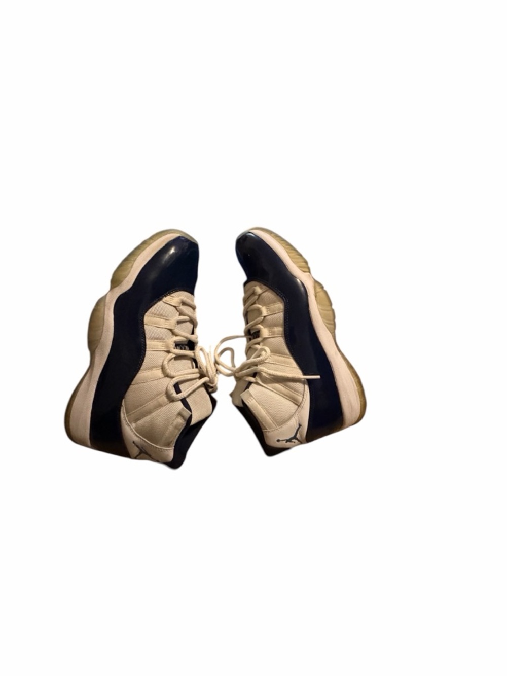 Jordan Retro 11 Basketball Sneakers in Cream and Black